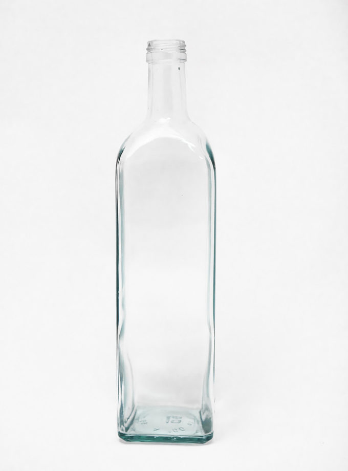 Láhev slivovice nazelenalá