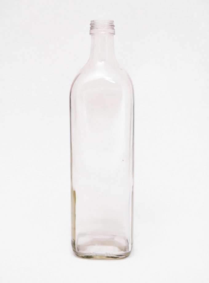 Láhev slivovice čirá